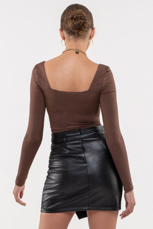 THE LET'S GO FAUX LEATHER SHORT SKIRT