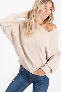 THE ESSENTIAL ASYMMETRIC SWEATER