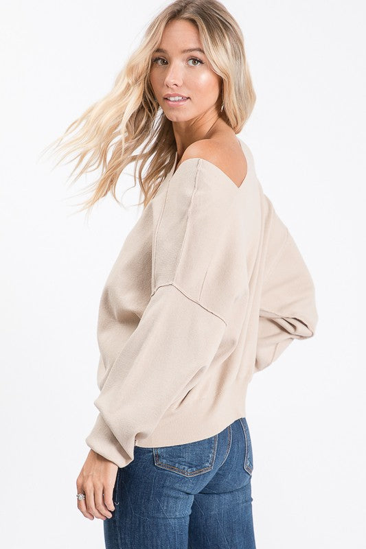 THE ESSENTIAL ASYMMETRIC SWEATER