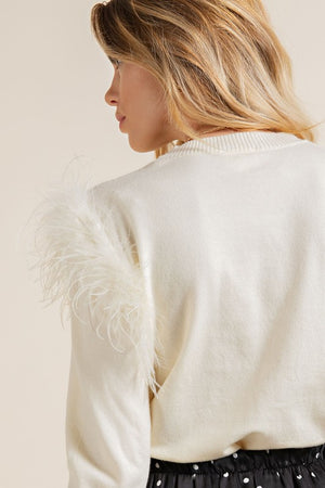 THE FEATHERY SNOWFLAKE KNIT