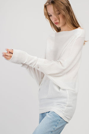 THE ESSENTIAL LIGHTWEIGHT ASYMMETRIC TOP