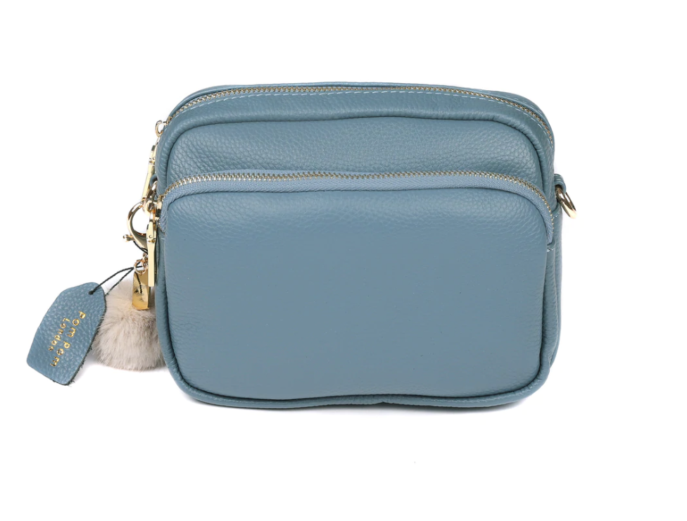 Blue leather cross body top bags
